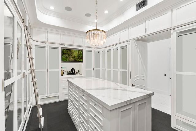 a very nice looking dining room with a chandelier