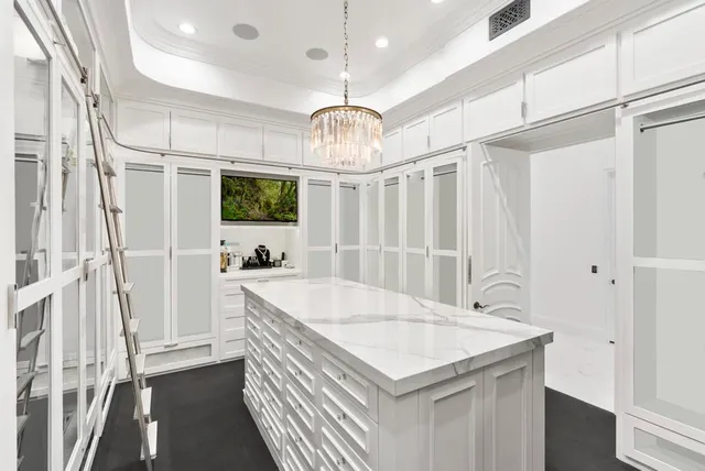 a very nice looking dining room with a chandelier