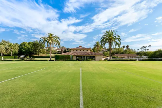 a view of a lake with a big yard