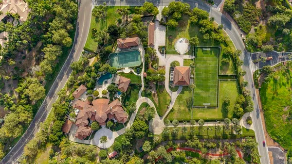 a view of a city with mountains in the background