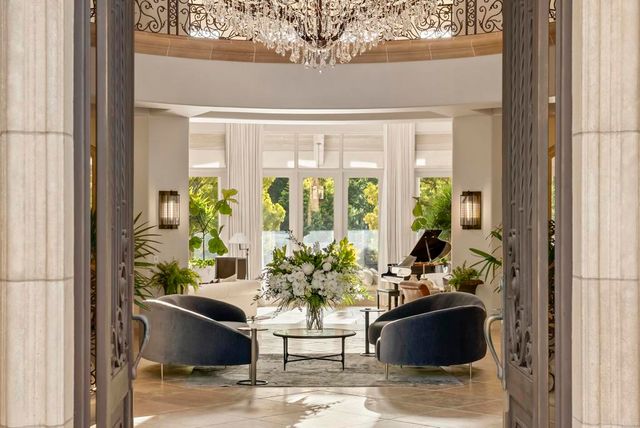 a view of a living room and dining room