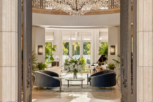 a view of a living room and dining room