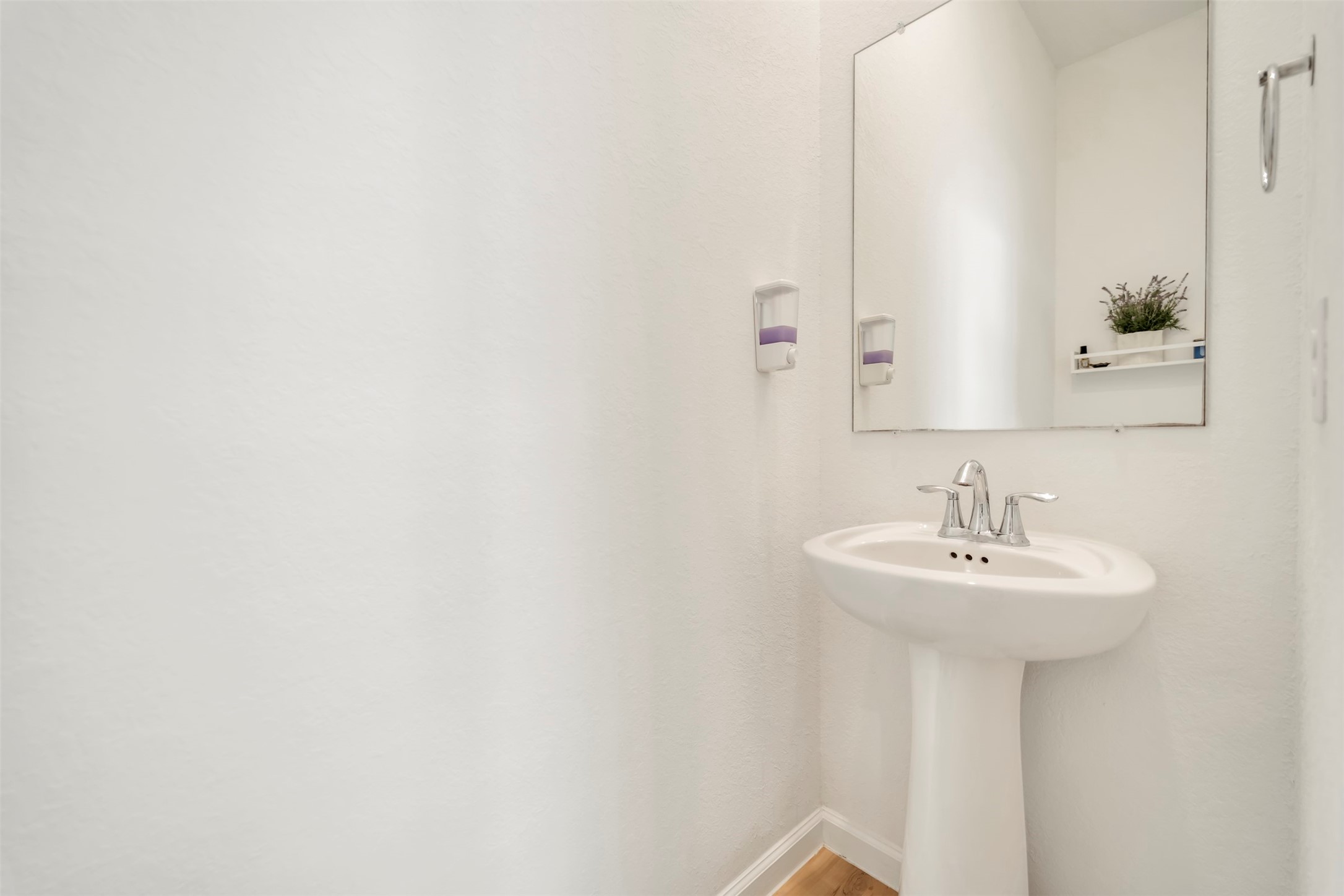 4127 Champlain Way Iowa Colony, TX 77583 - Photo 17 of 35 a bathroom with a sink a mirror and a shower
