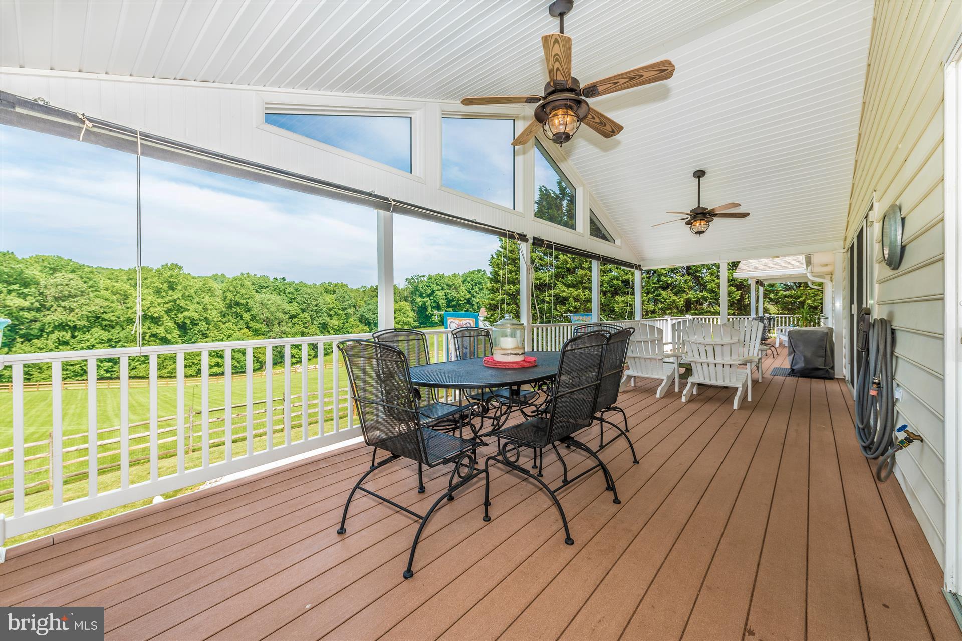 1880 Florence Road Mount Airy, MD 21771 - Photo 3 of 30 a view of a roof deck with table and chairs a barbeque with wooden floor