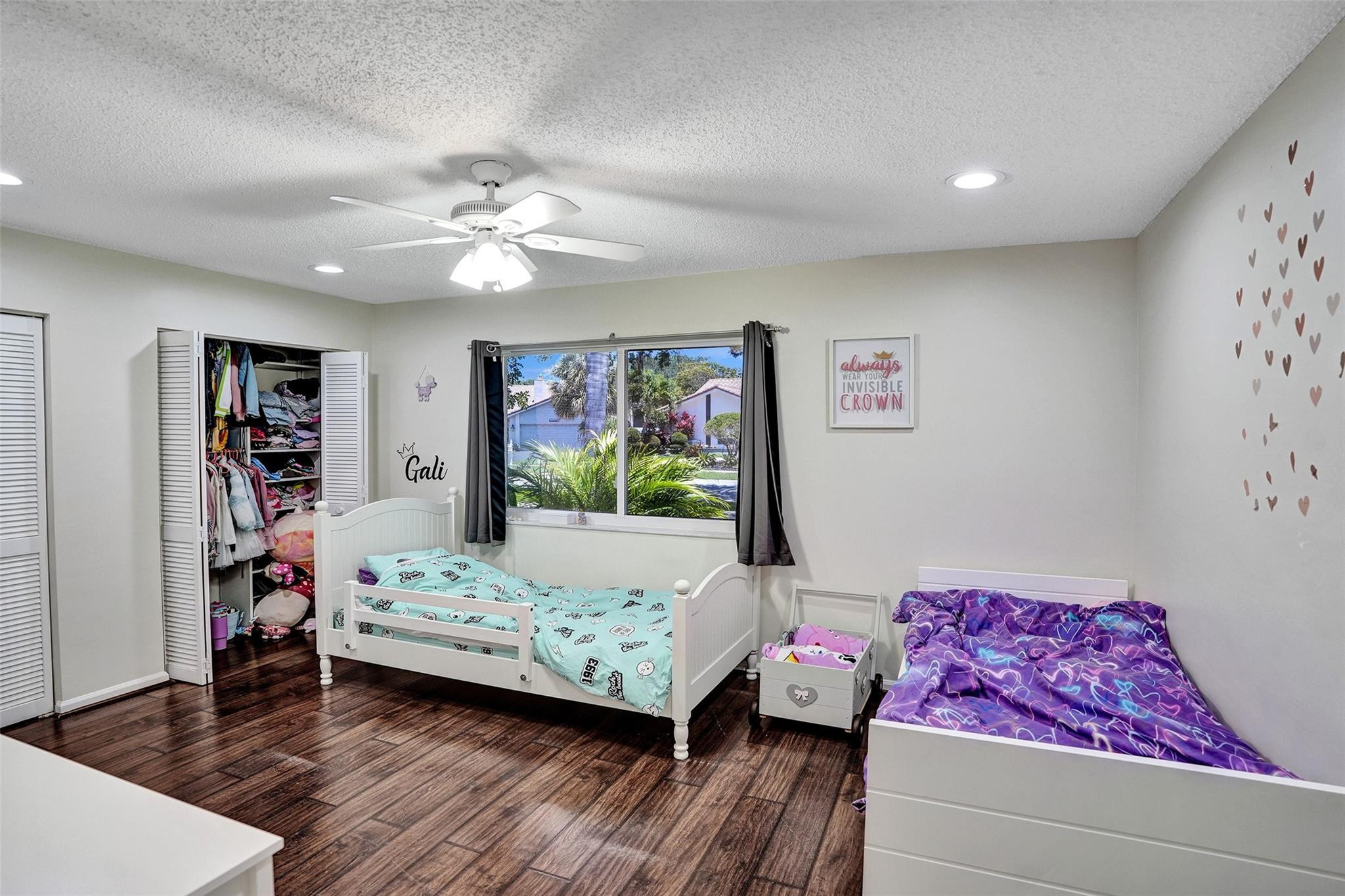 10130 Northwest 13th Street Plantation, FL 33322 - Photo 13 of 23 a bedroom with furniture and a large window