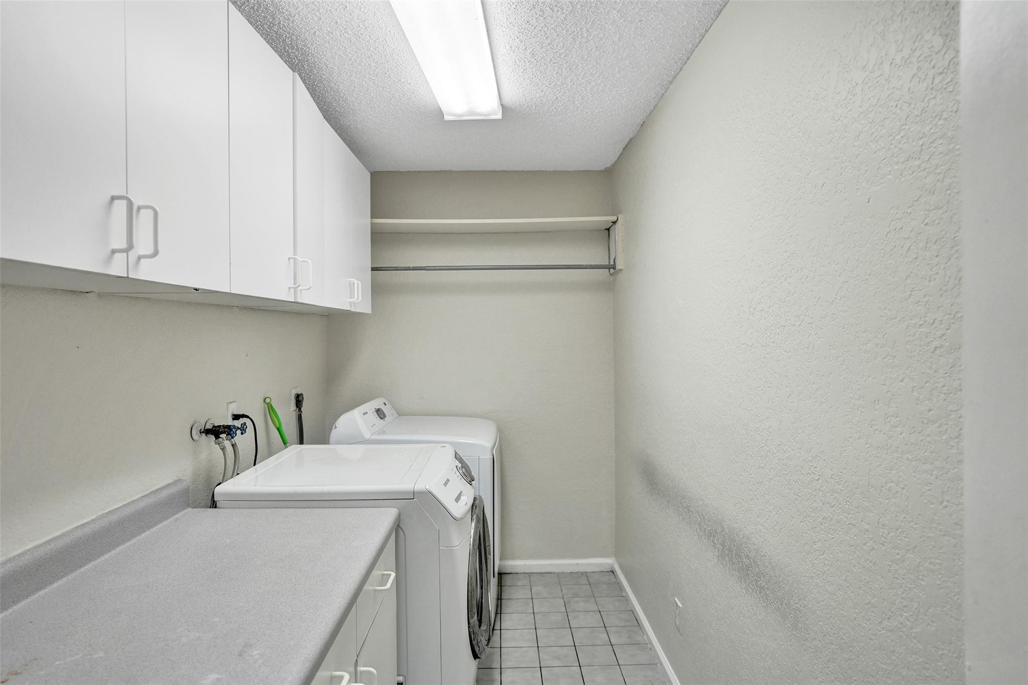 10130 Northwest 13th Street Plantation, FL 33322 - Photo 15 of 23 a utility room with sink dryer and washer