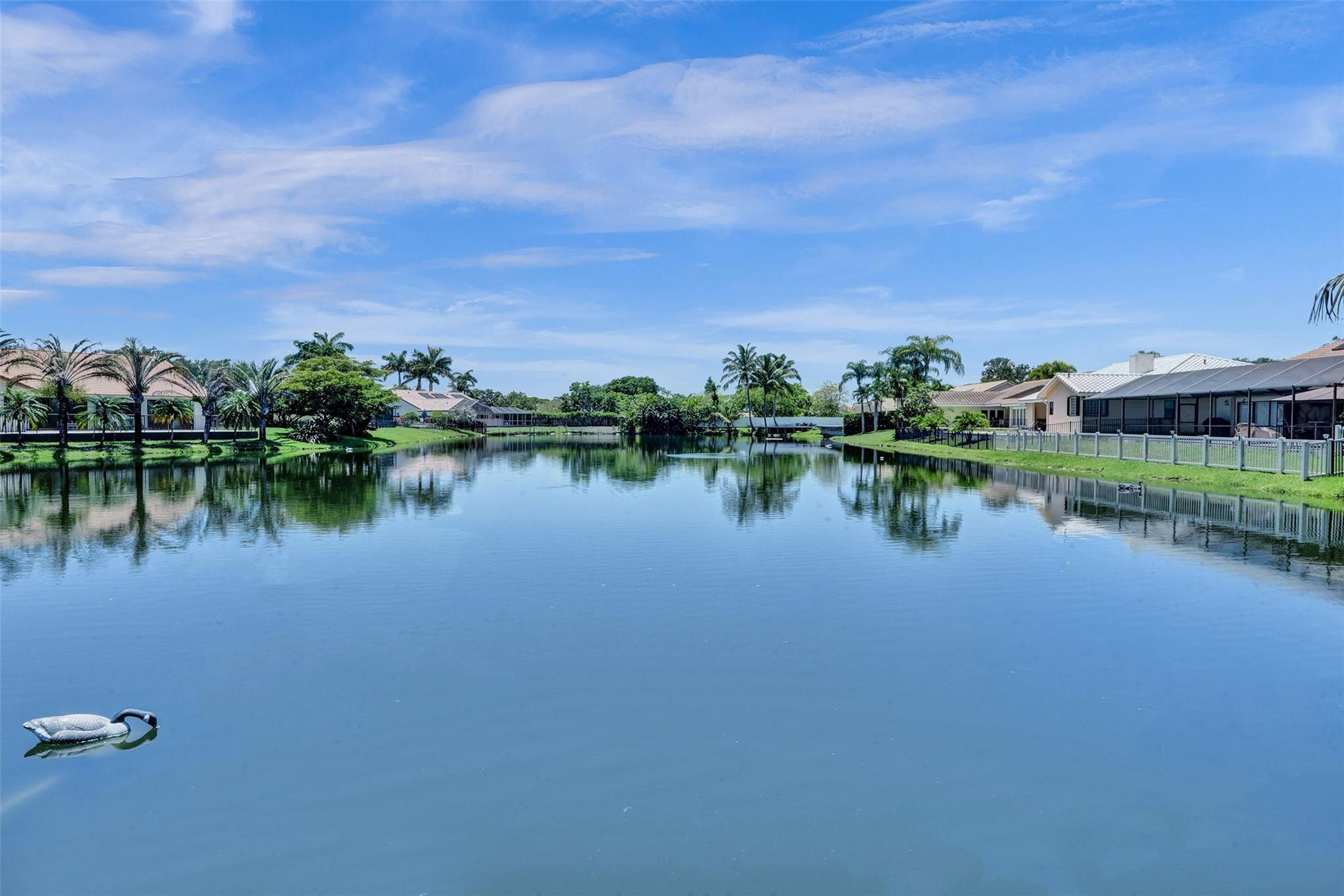 10130 Northwest 13th Street Plantation, FL 33322 - Photo 23 of 23 a view of a lake with houses in the back