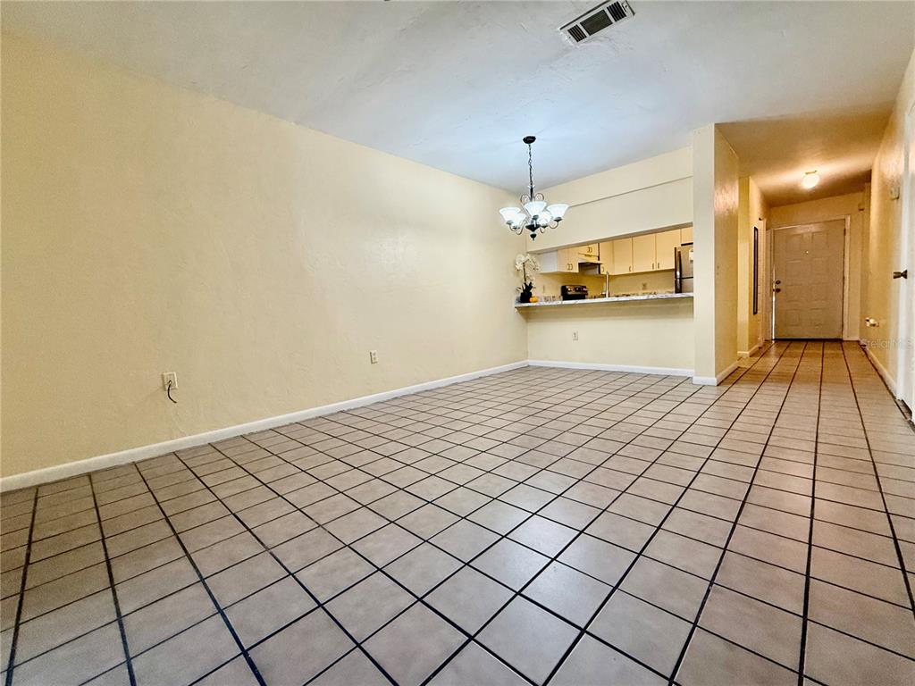 2735 Southwest 35th Place, Unit 1604 Gainesville, FL 32608 - Photo 11 of 25 a view of a livingroom with the kitchen