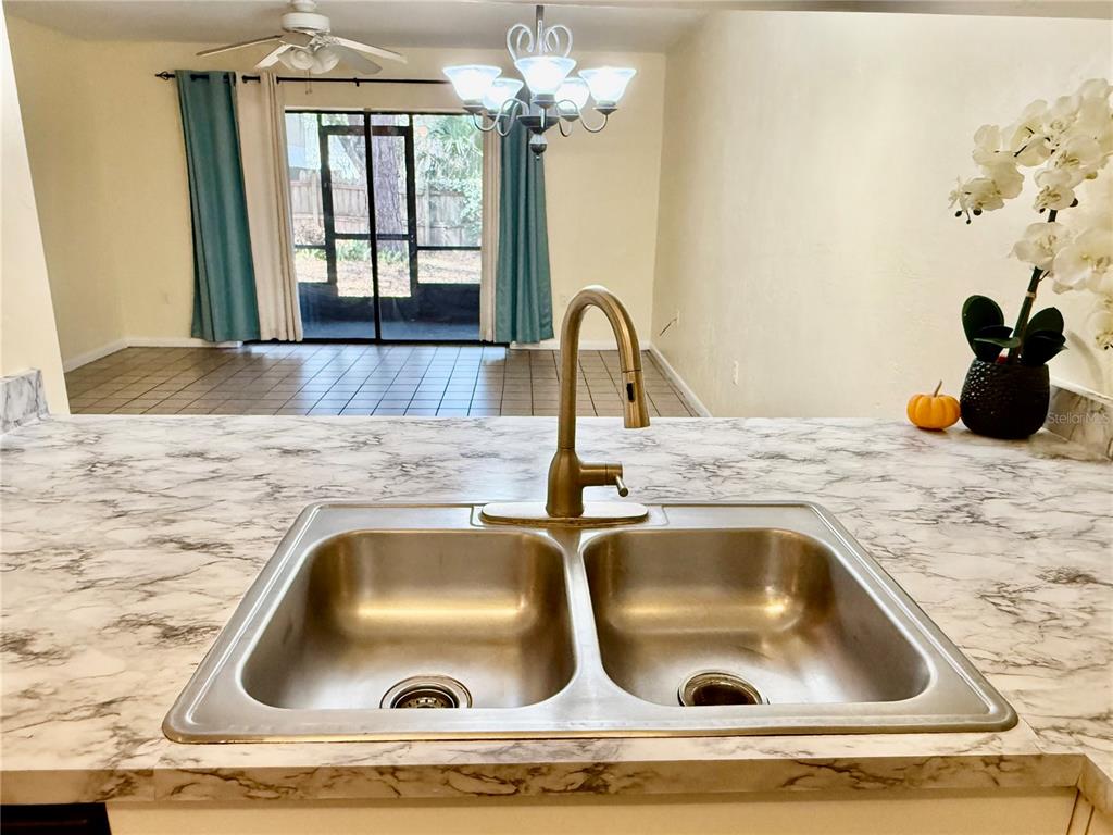 2735 Southwest 35th Place, Unit 1604 Gainesville, FL 32608 - Photo 7 of 25 a close view of sink and tap