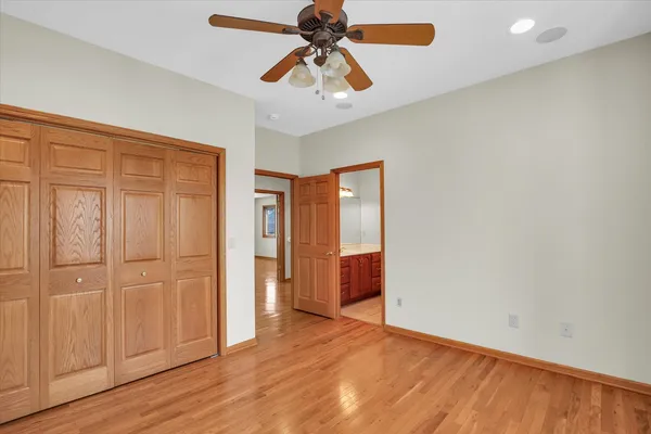 a view of a swimming pool with a lounge chair
