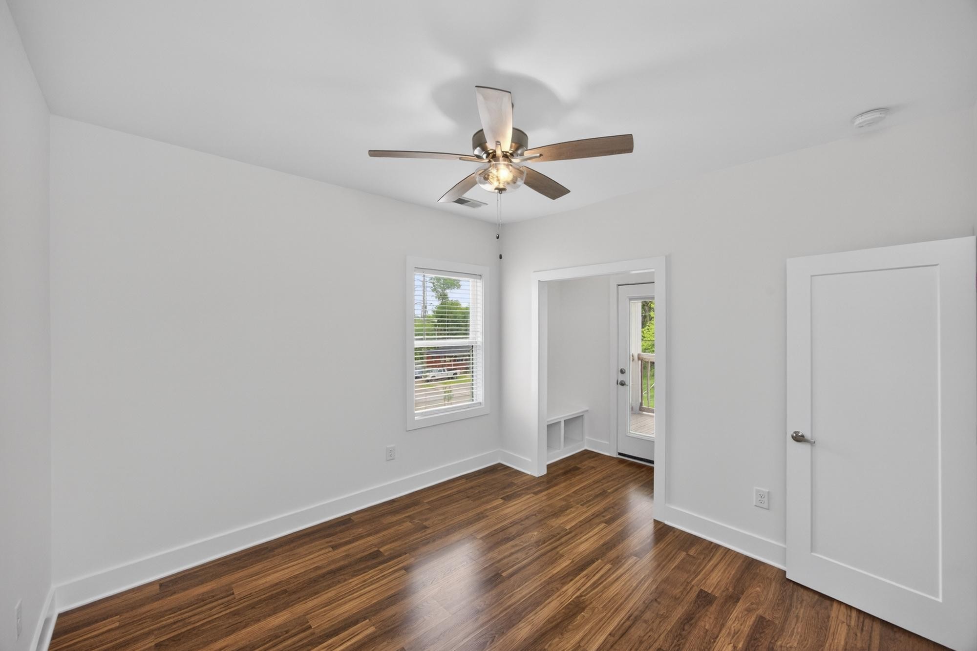 7 Decatur Street Nashville, TN 37210 - Photo 32 of 43 wooden floor in an empty room with a window