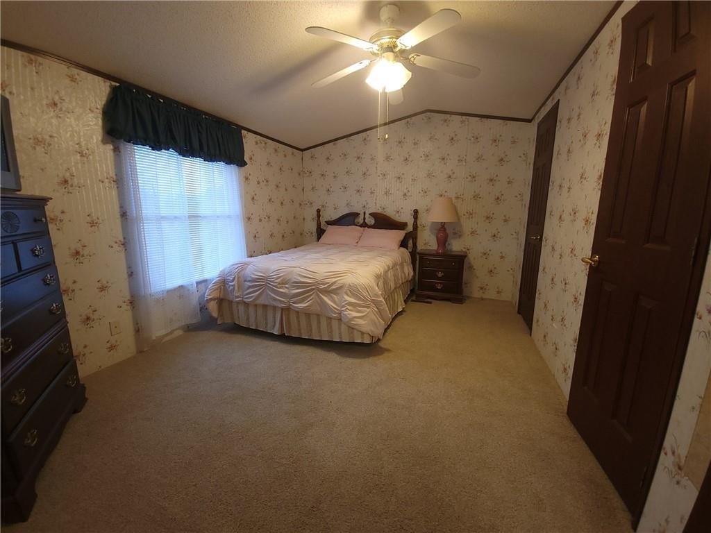 28 K And L Lane Butler, PA 16001 - Photo 15 of 18 a bedroom with a bed and a window