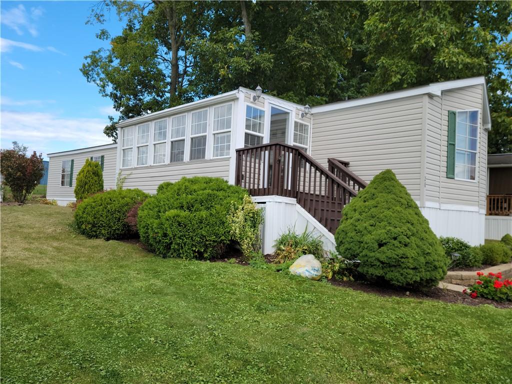 28 K And L Lane Butler, PA 16001 - Photo 2 of 18 a view of a house with a yard and plants