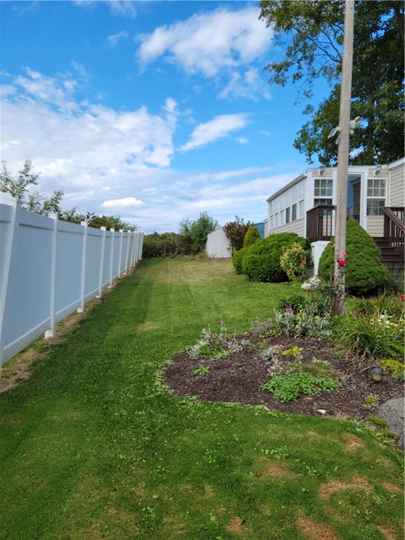 28 K And L Lane Butler, PA 16001 - Photo 3 of 18 a view of a garden with a building in the background