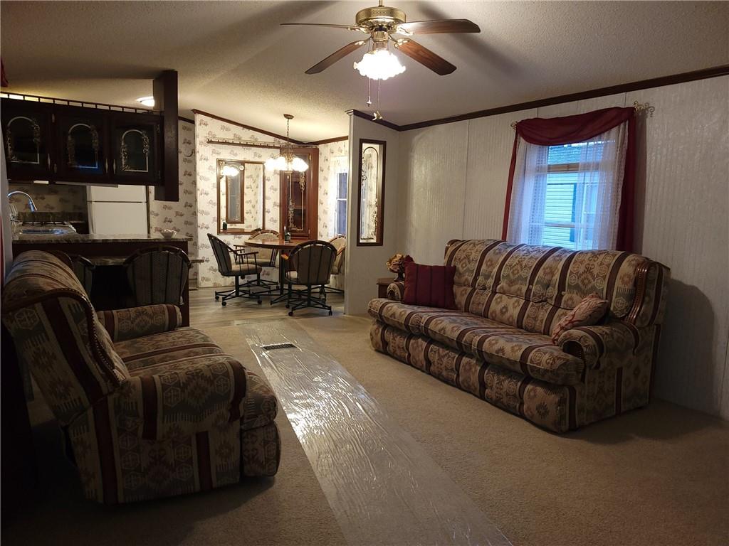28 K And L Lane Butler, PA 16001 - Photo 8 of 18 a living room with furniture