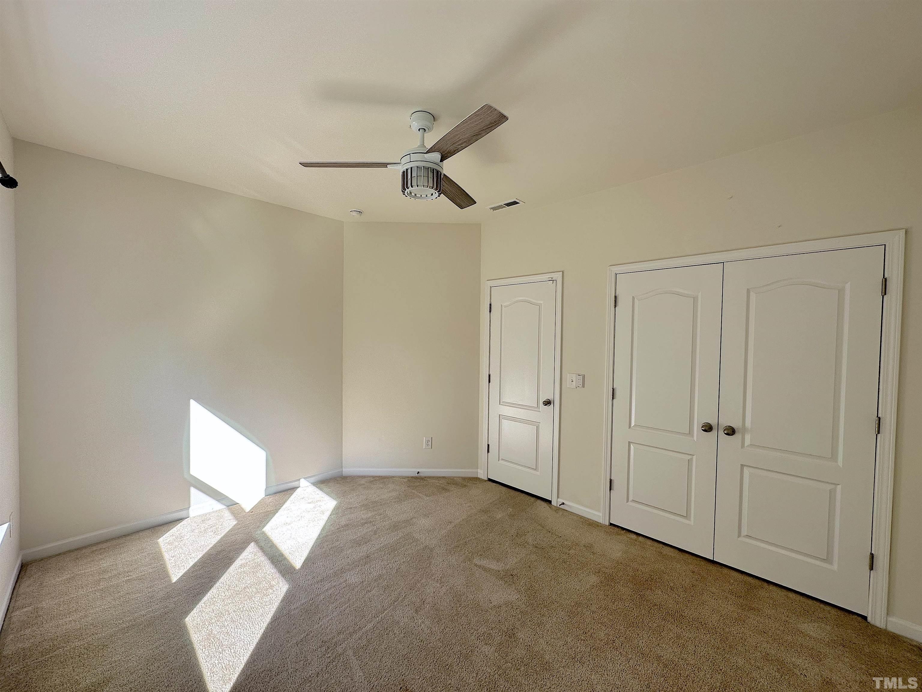 205 Azalea View Way Holly Springs, NC 27540 - Photo 13 of 29 a view of an empty room