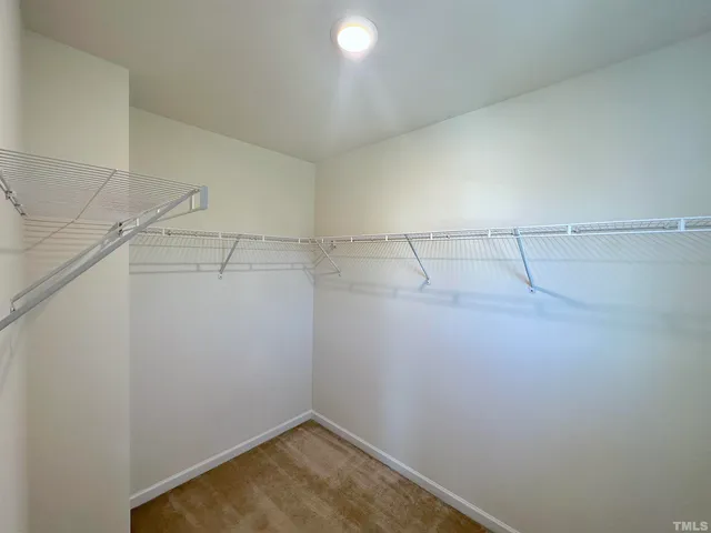 a view of a room with racks on the wall