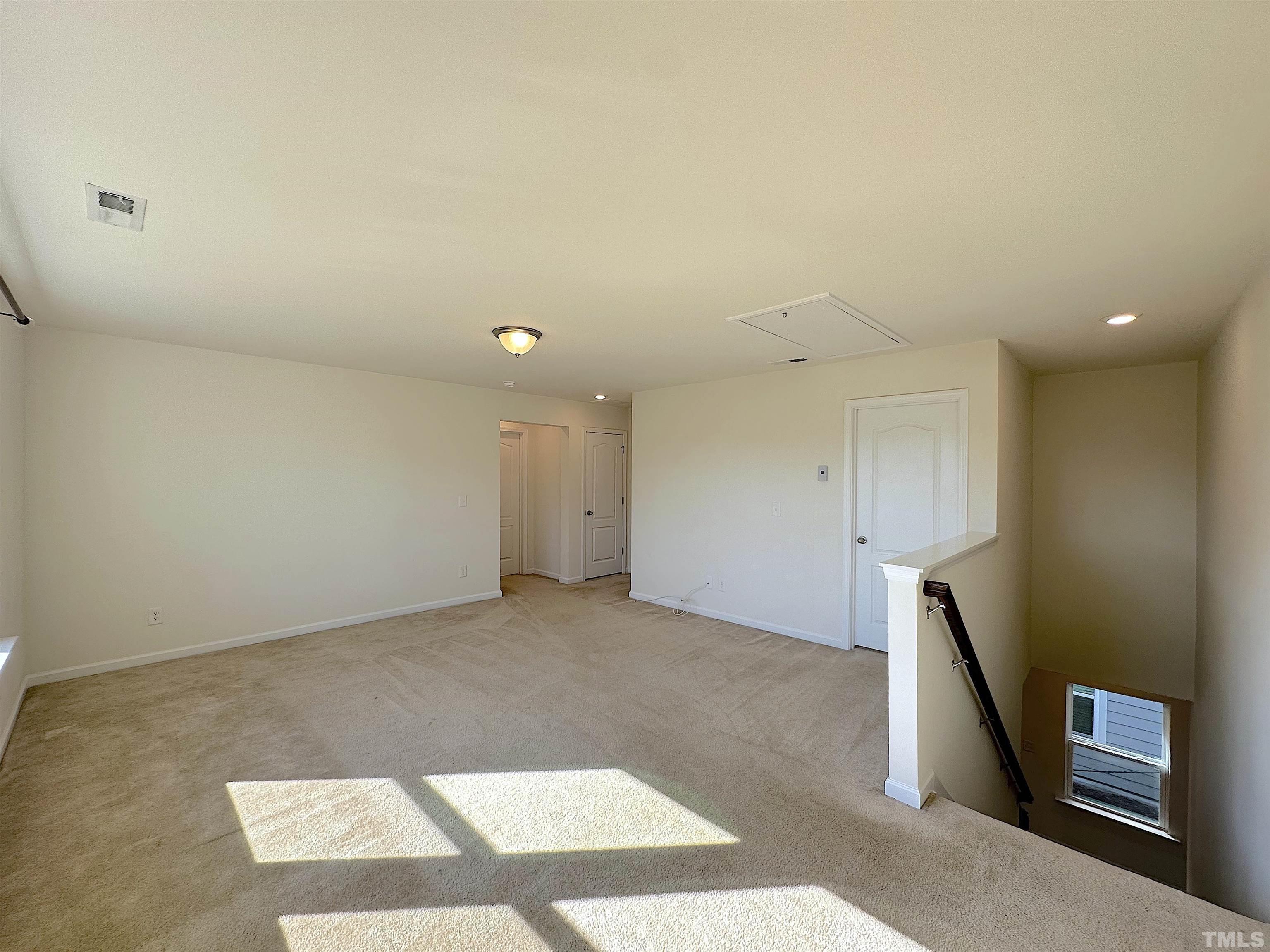 205 Azalea View Way Holly Springs, NC 27540 - Photo 21 of 29 a view of an empty room