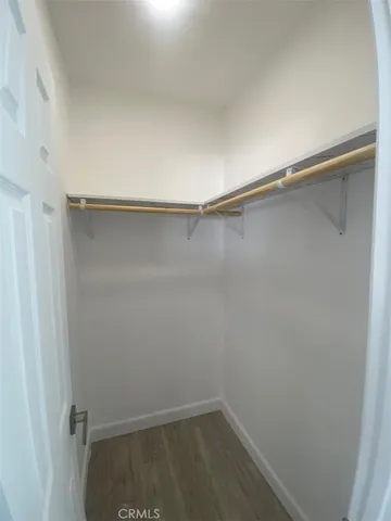 a small space with a wooden door