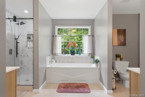 29 Hickory Hill Road Newburgh, NY 12550 - Photo 31 of 47 a bathroom with a tub a sink and a window