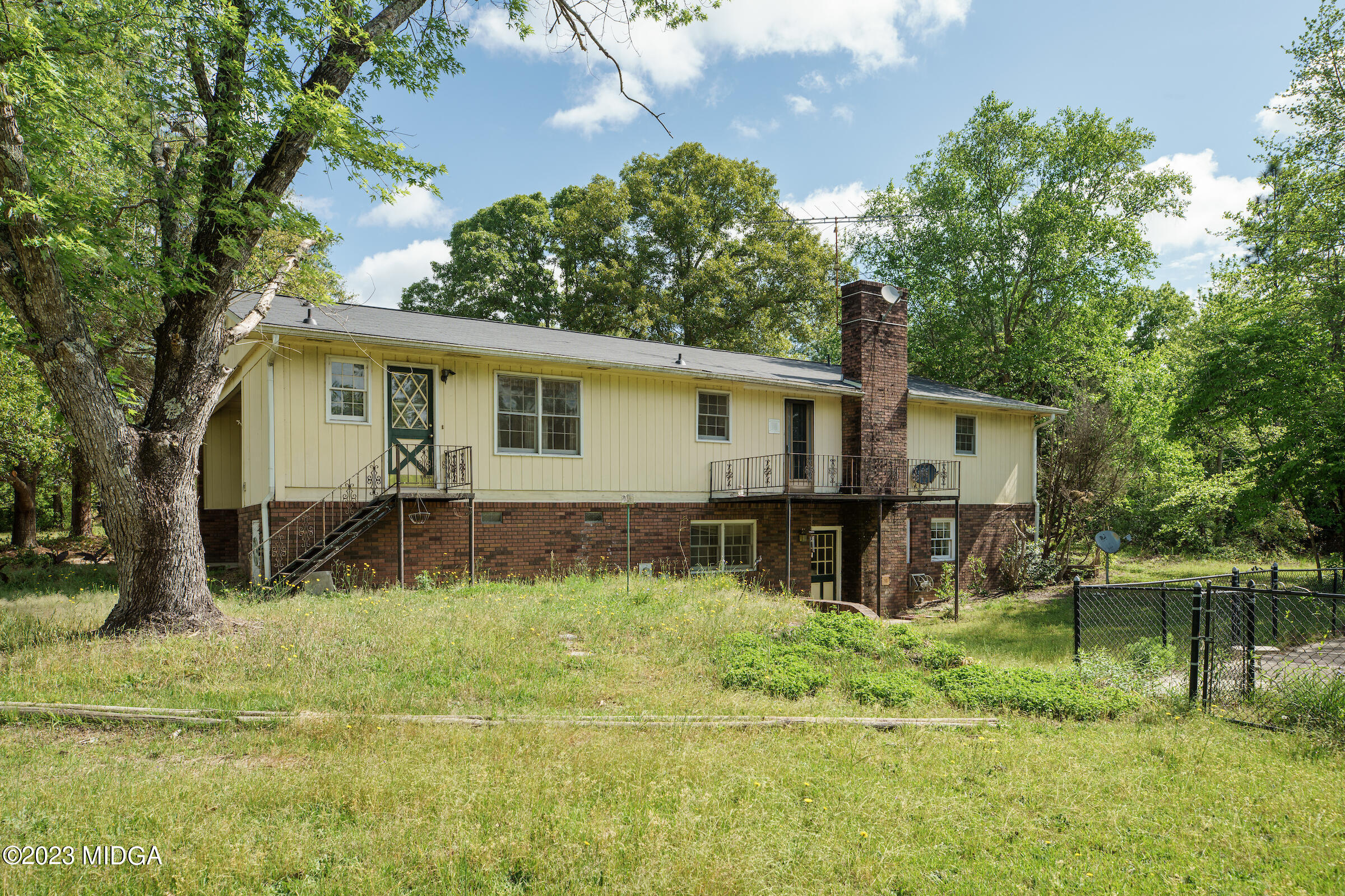 200 Gunters Mill Road Byron, GA 31008 - Photo 3 of 44 a view of a house with a yard