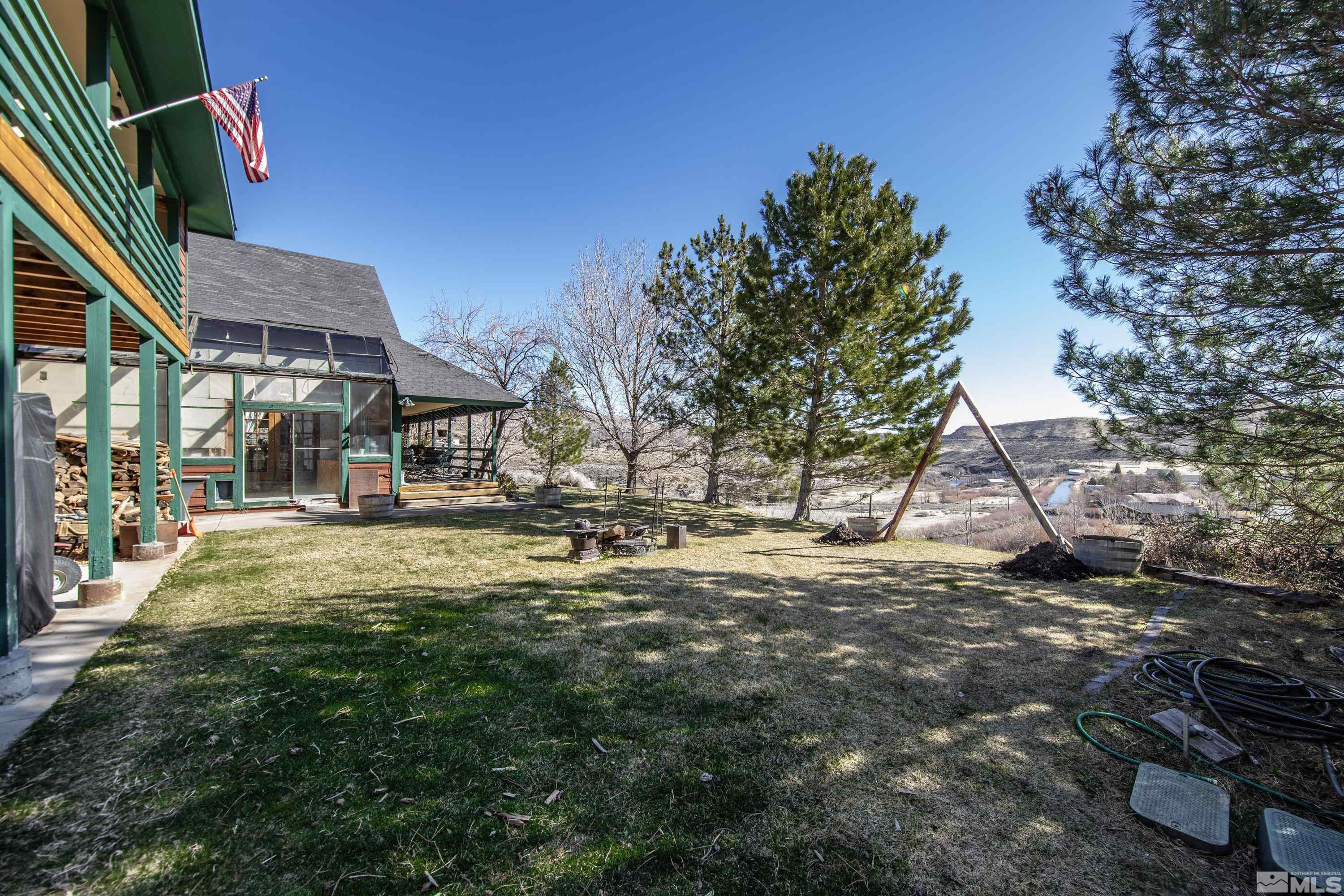 3380 Mario Road Reno, NV 89523 - Photo 14 of 40 a view of a house with a yard