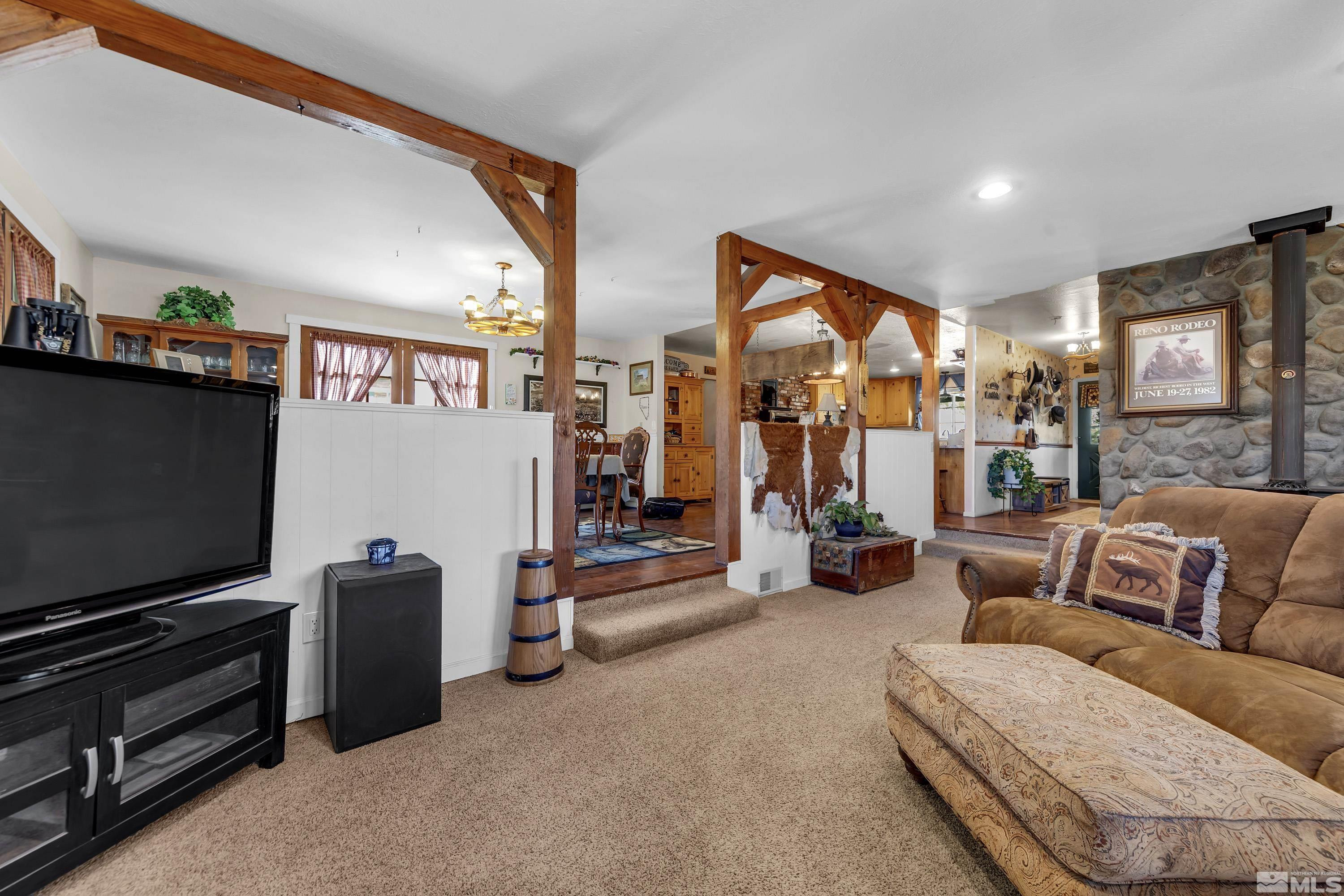 3380 Mario Road Reno, NV 89523 - Photo 18 of 40 a living room with furniture and a flat screen tv