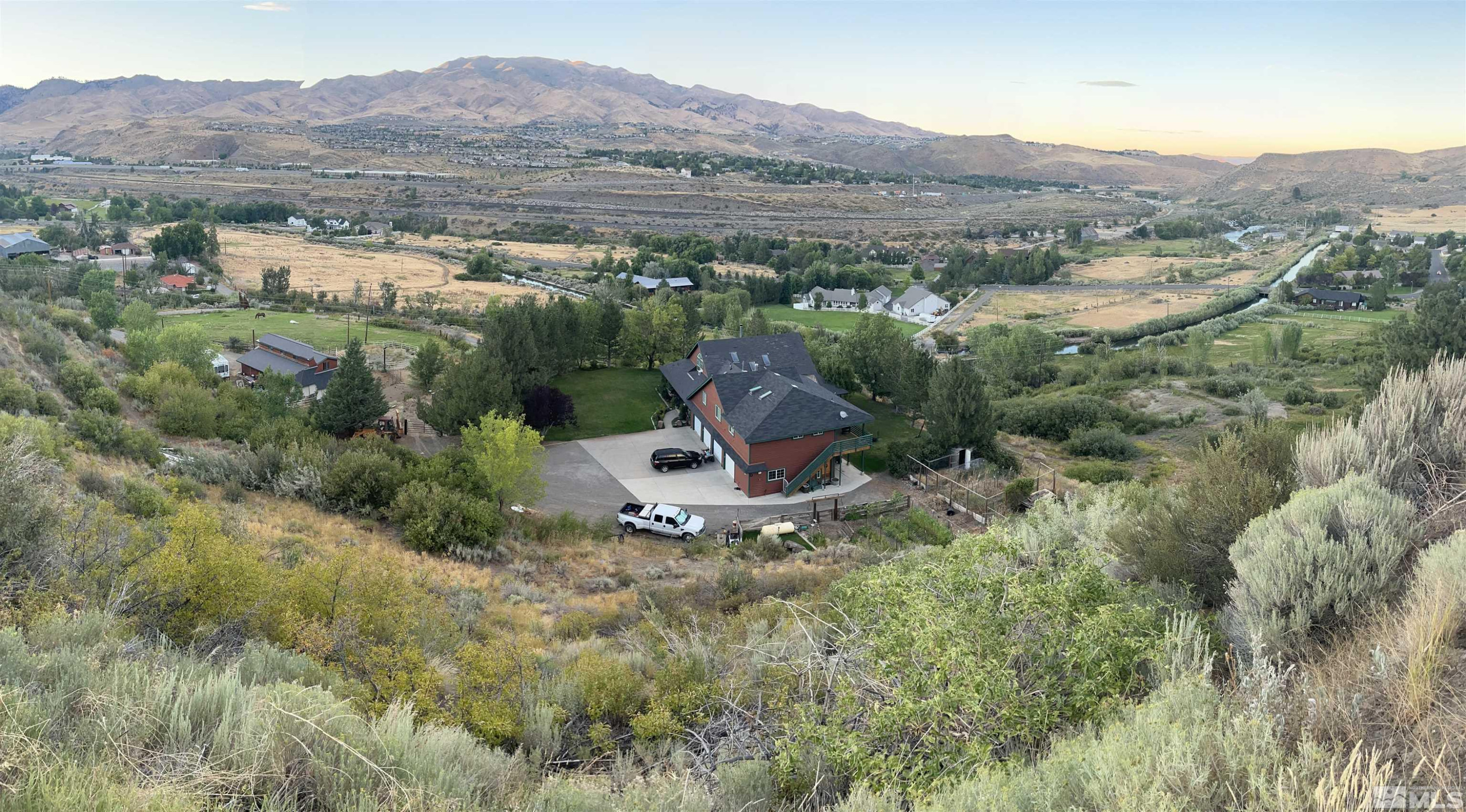 3380 Mario Road Reno, NV 89523 - Photo 2 of 40 a view of a lush green field