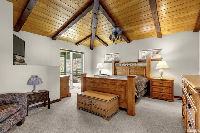 a bed room with furniture and a window