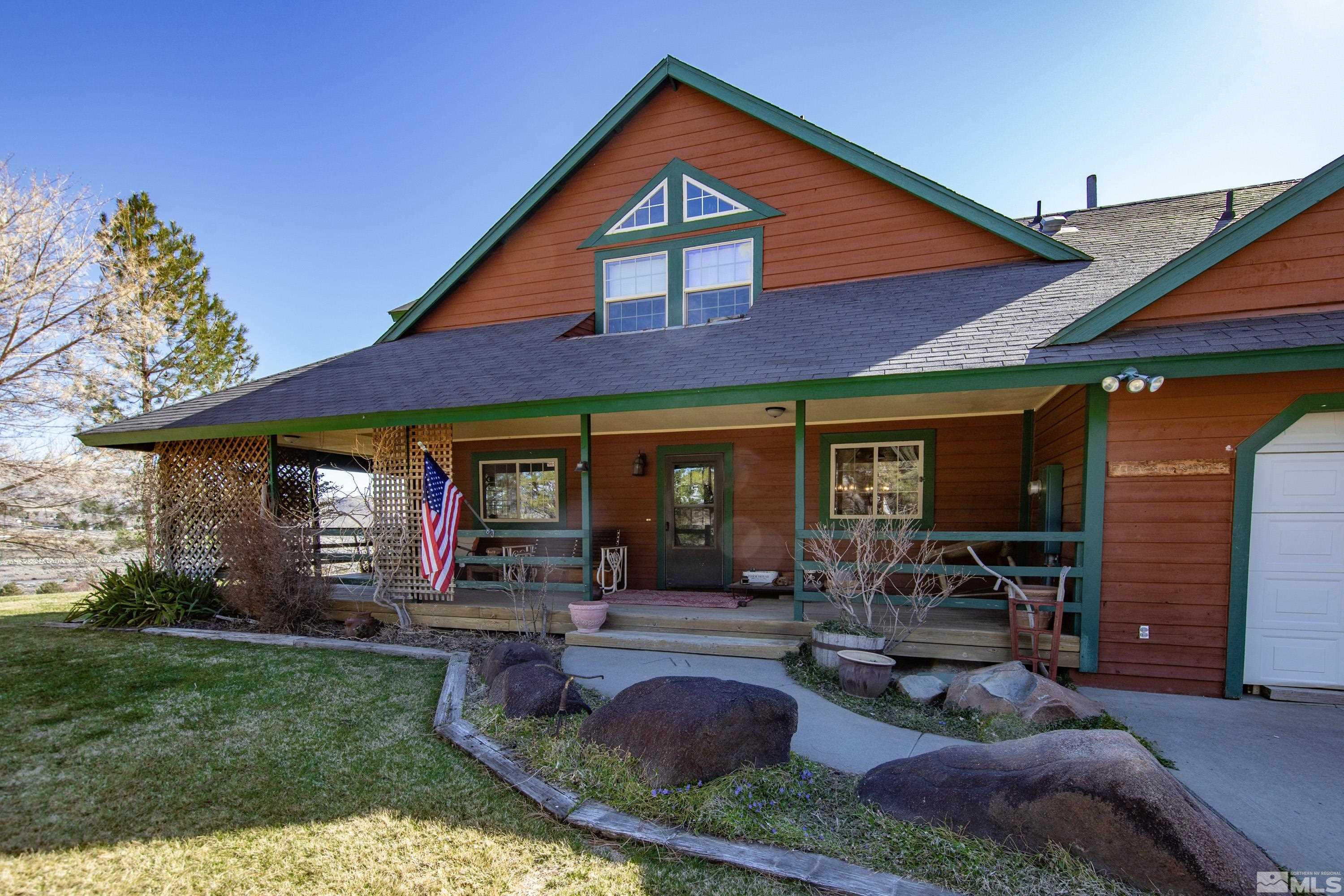 3380 Mario Road Reno, NV 89523 - Photo 37 of 40 a view of a house with sitting area and garden