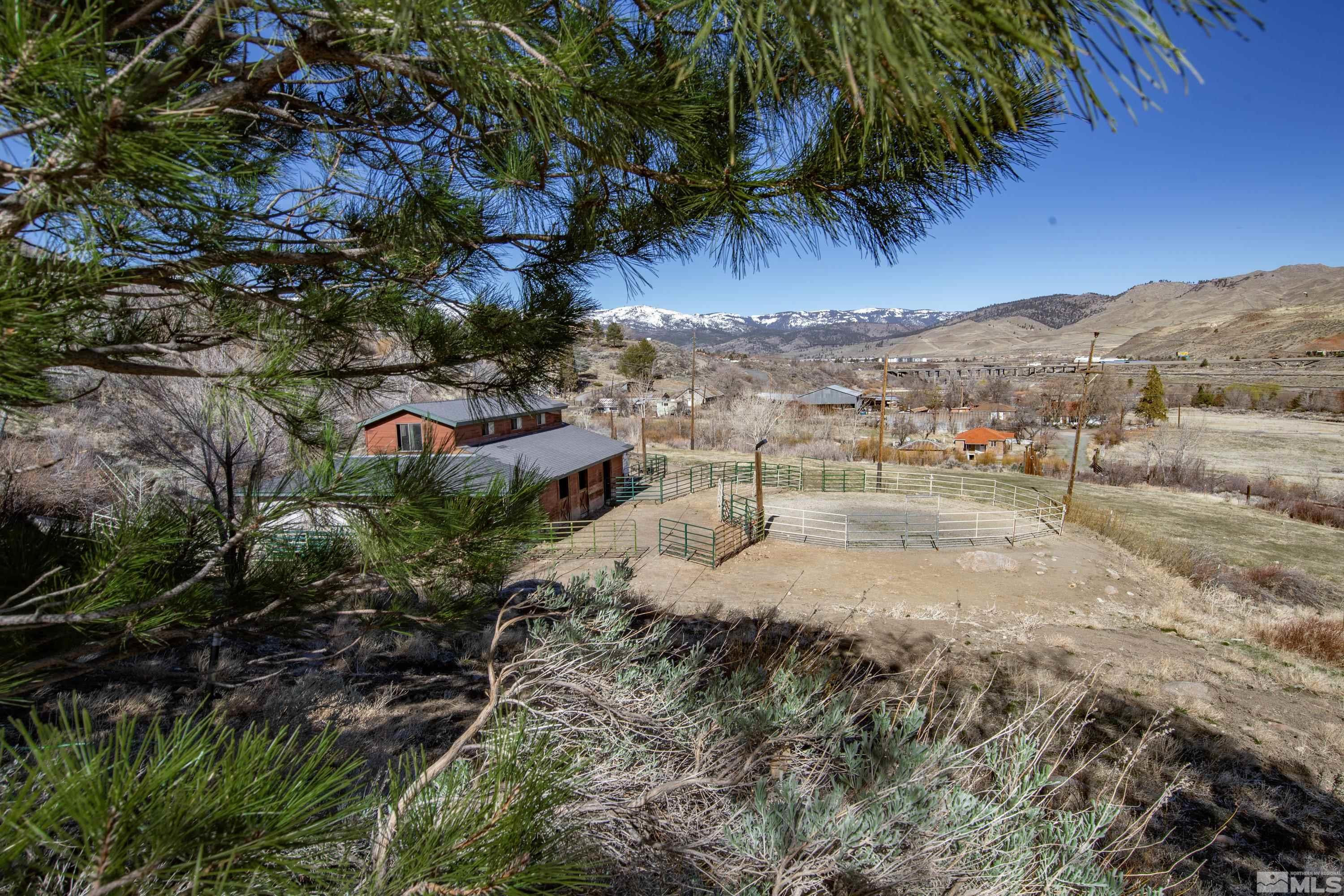 3380 Mario Road Reno, NV 89523 - Photo 38 of 40 a view of a yard with wooden fence