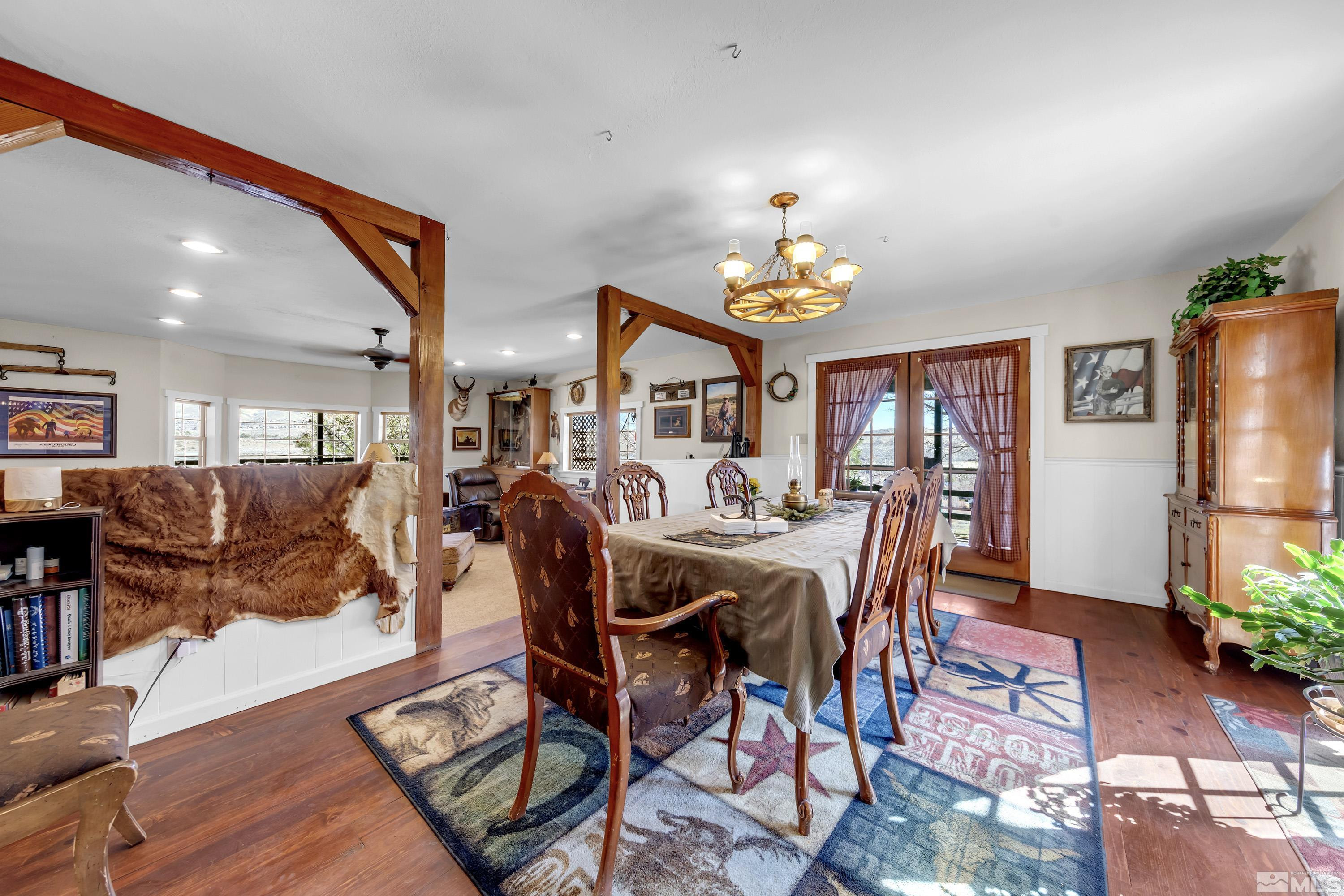 3380 Mario Road Reno, NV 89523 - Photo 9 of 40 a view of a dining room with furniture and a chandelier