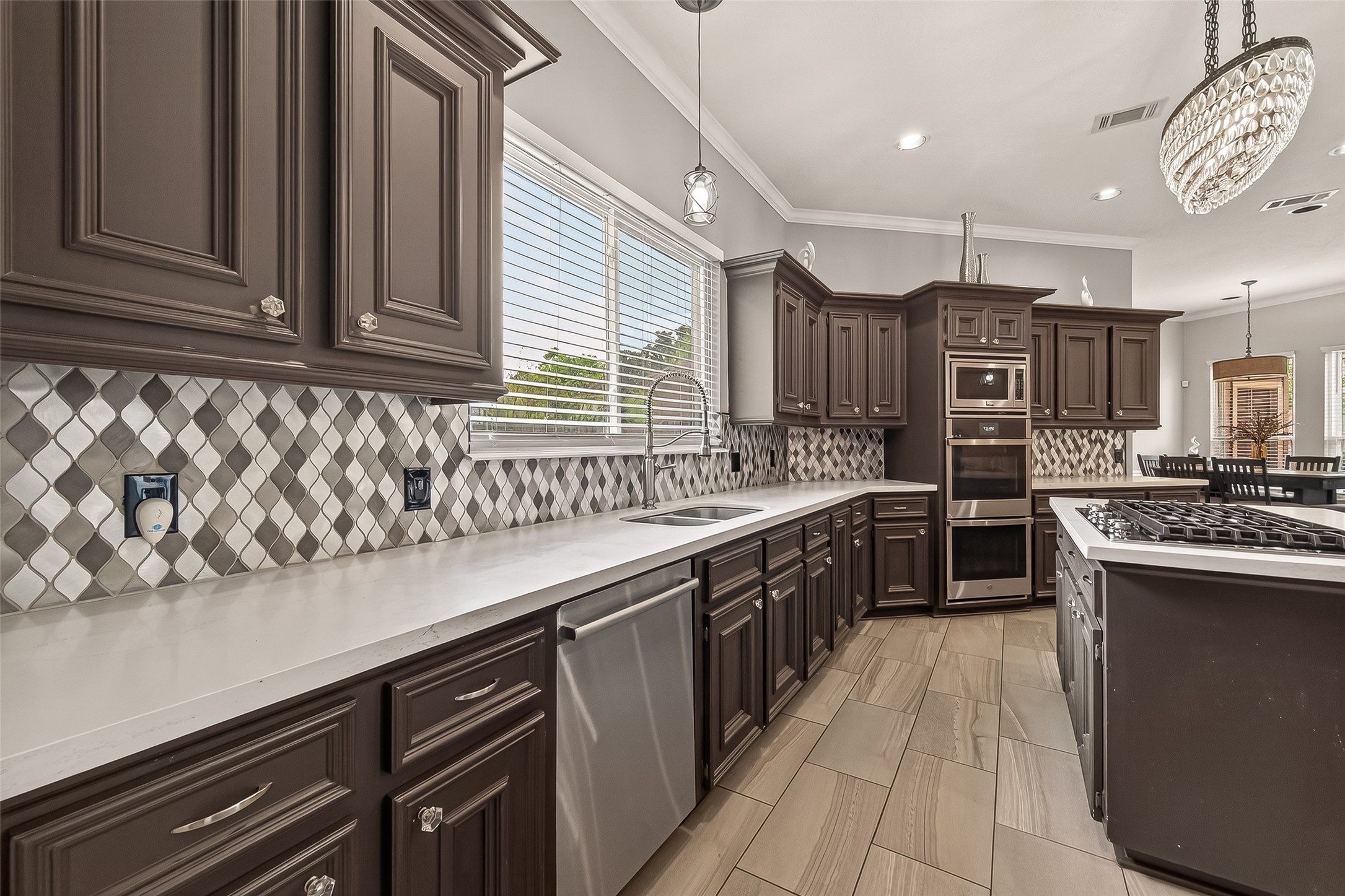 17107 Wunder Hill Drive Spring, TX 77379 - Photo 14 of 48 This kitchen is a chef's dream with double ovens and gas cooktop!