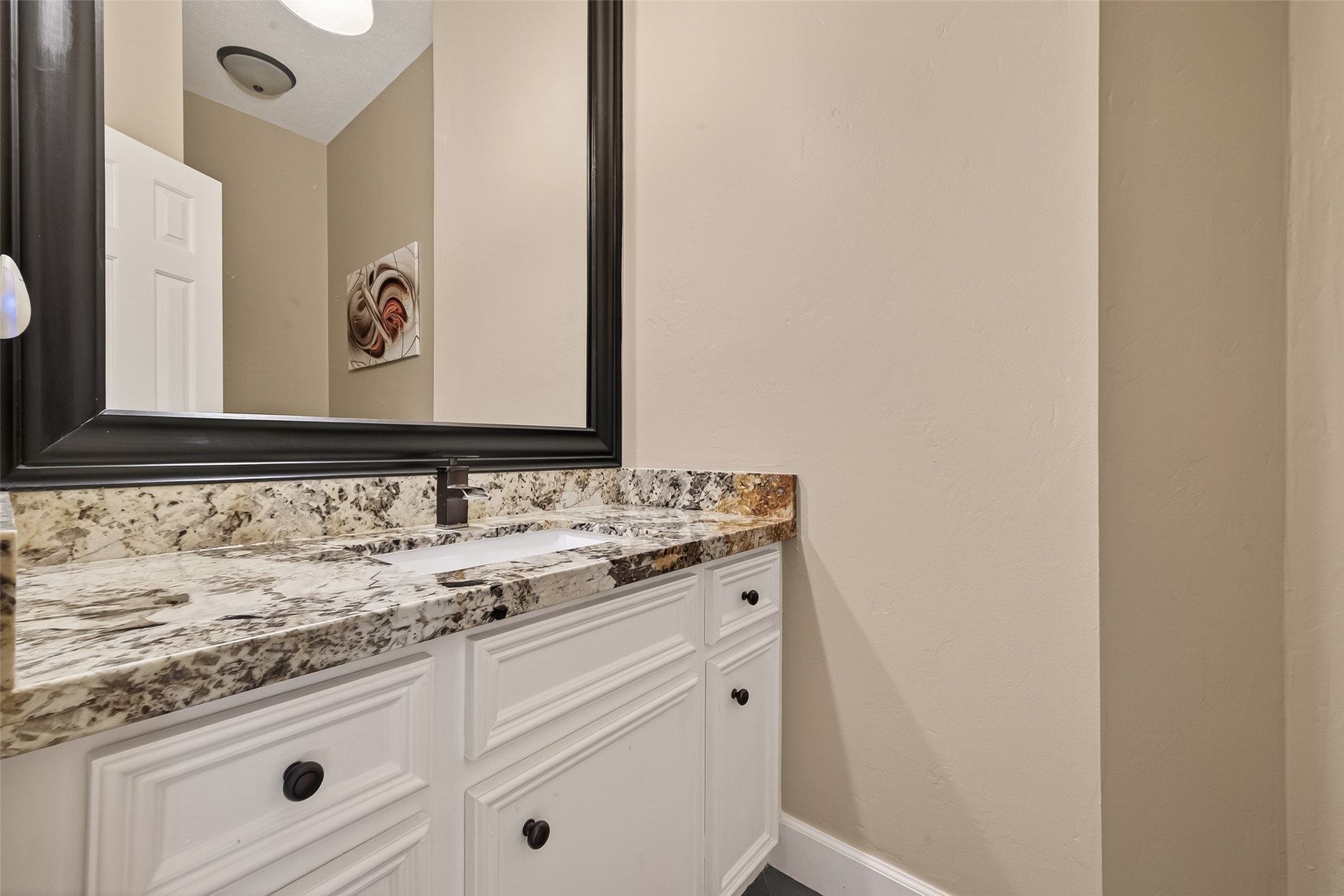17107 Wunder Hill Drive Spring, TX 77379 - Photo 18 of 48 Powder bath is tucked away from the living spaces.