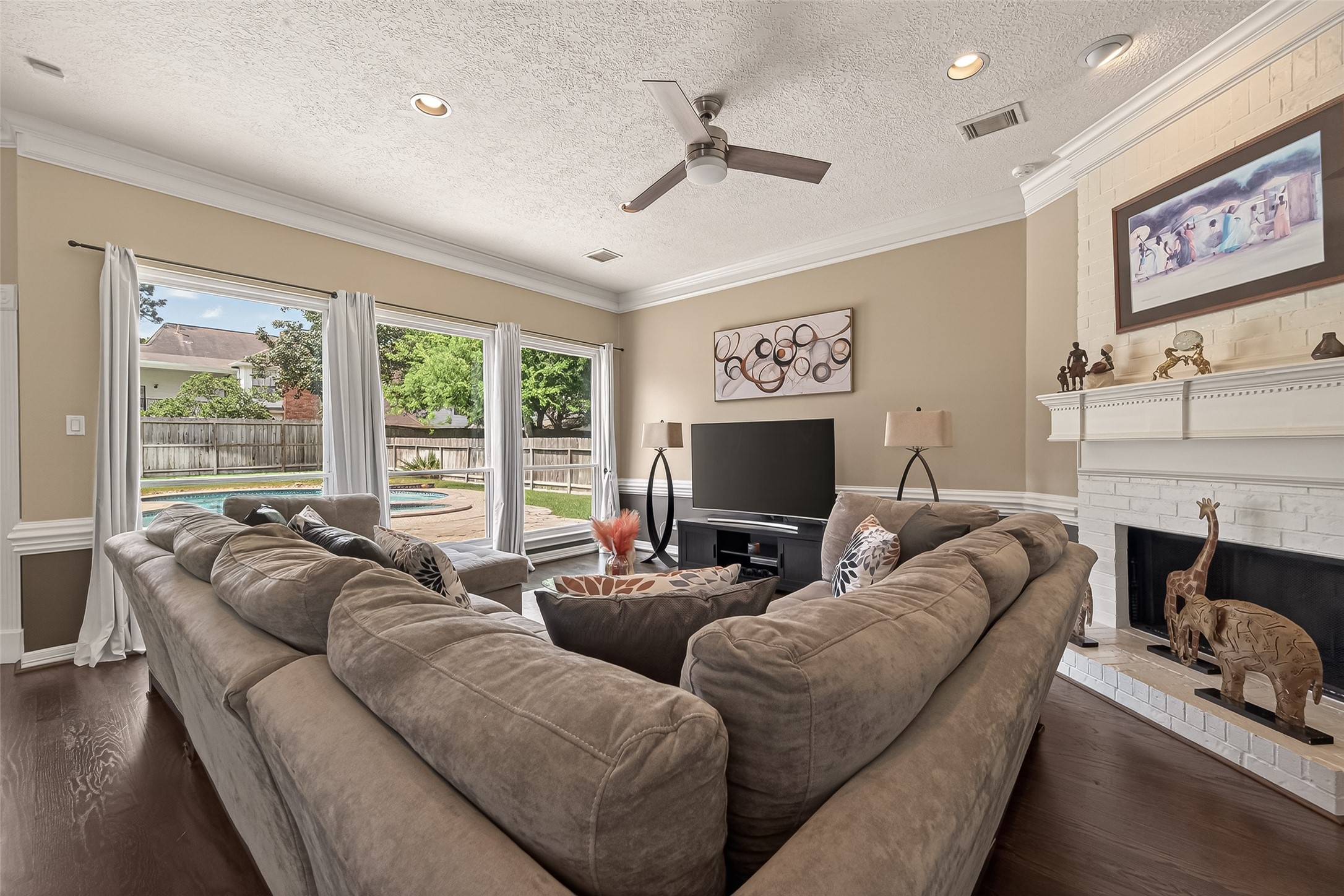 17107 Wunder Hill Drive Spring, TX 77379 - Photo 9 of 48 Large family room with gas fireplace.