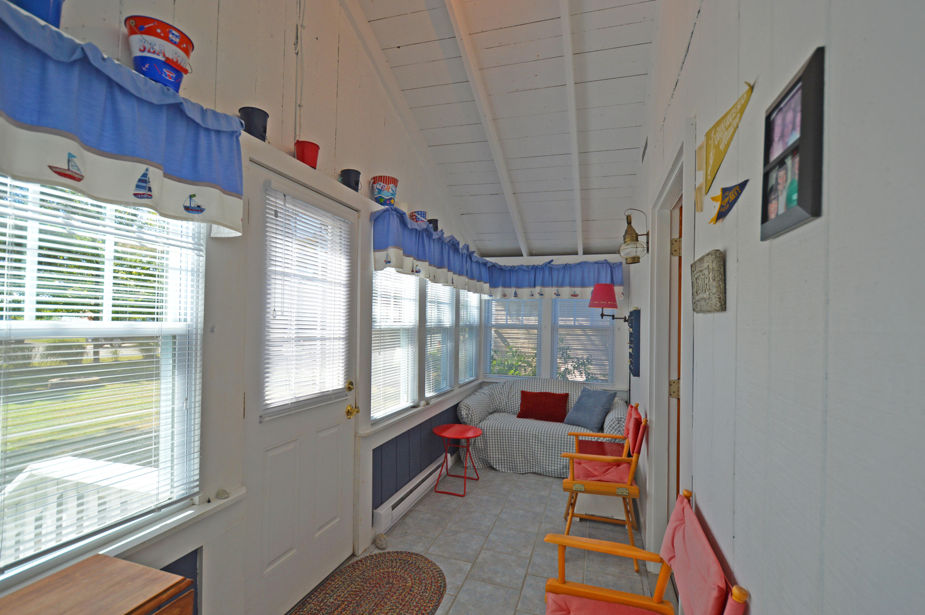 27 Dyke Road, Unit 27 Kennebunkport, ME 04046 - Photo 7 of 11 27_Dyke_Enclosed_PorchB