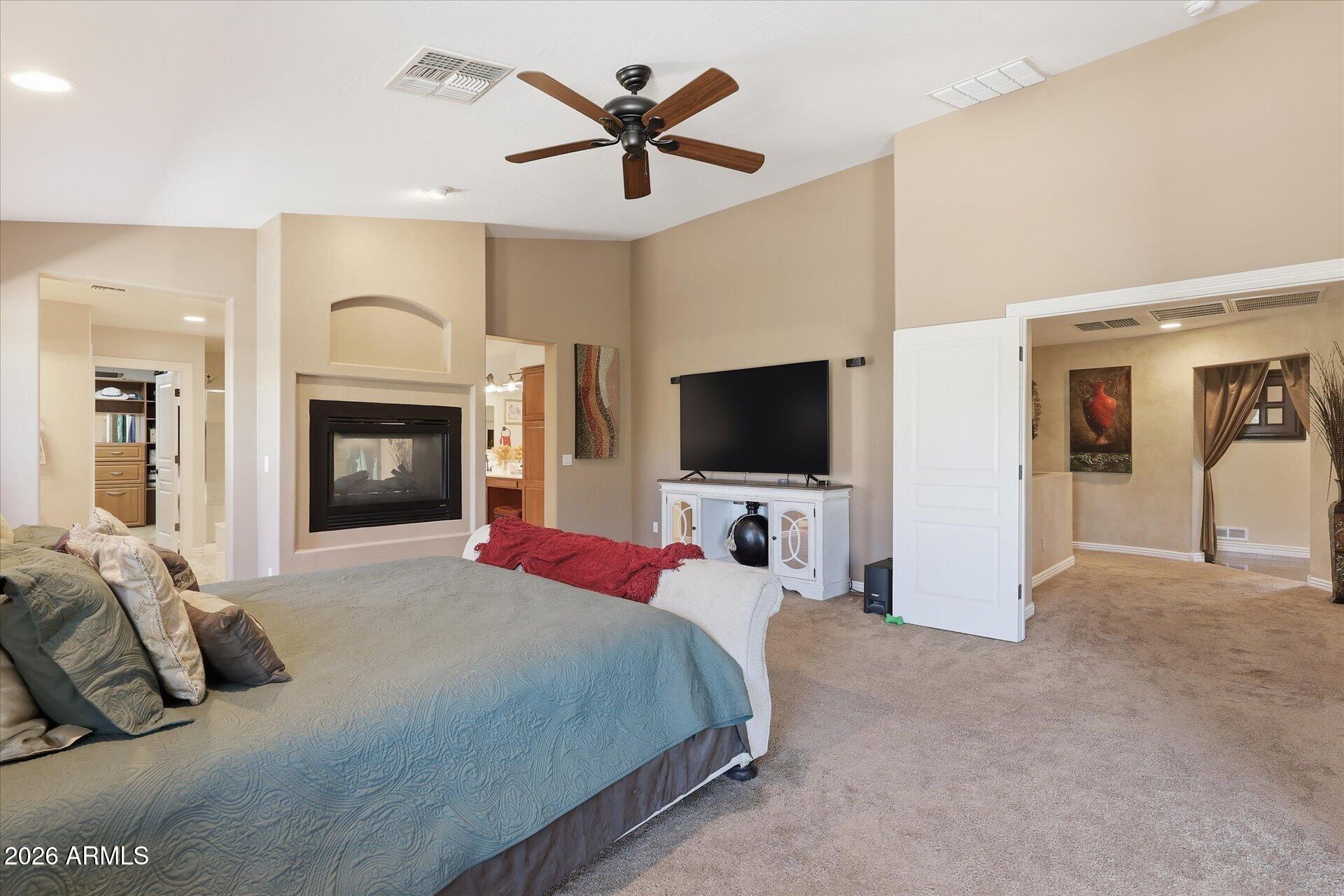 2324 West Zenith Lane Phoenix, AZ 85085 - Photo 38 of 85 Primary Bedroom 1 Two Way Fireplace