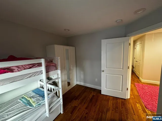 a view of a livingroom with wooden floor