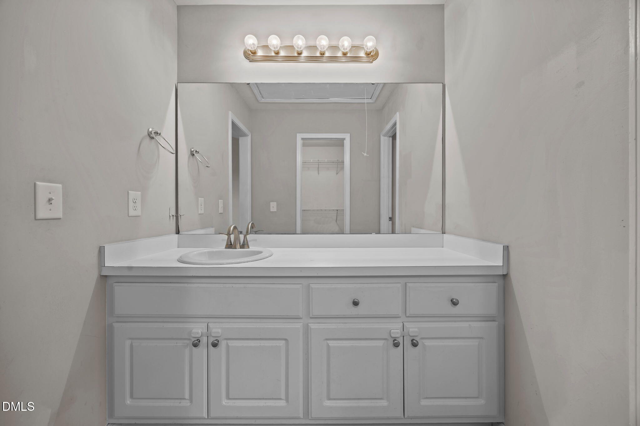 24 Sue Drive Angier, NC 27501 - Photo 12 of 39 a bathroom with a sink and a mirror