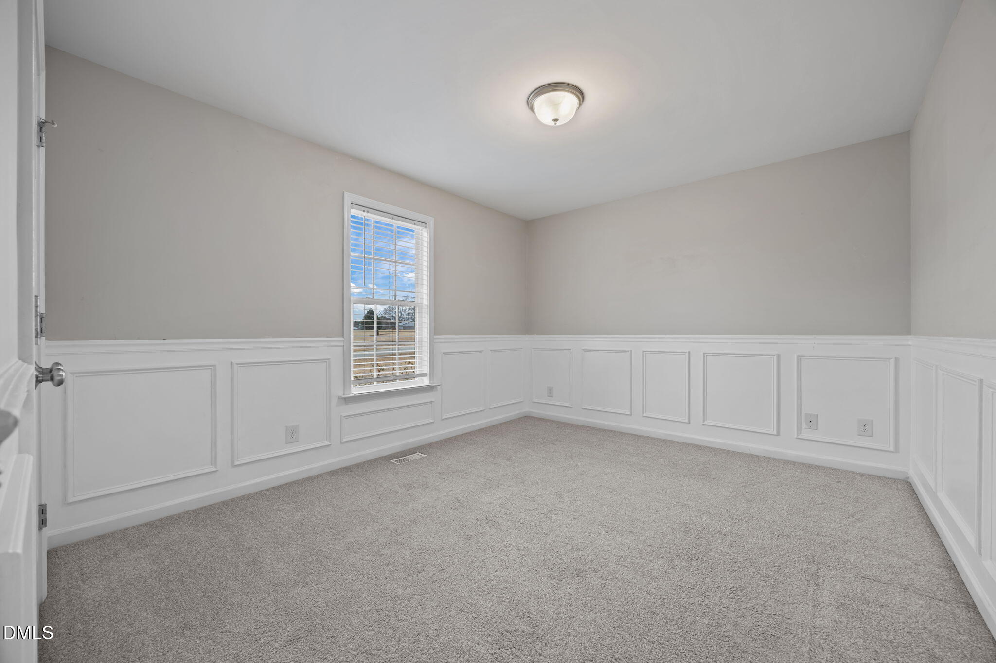 24 Sue Drive Angier, NC 27501 - Photo 18 of 39 a view of an empty room with a window