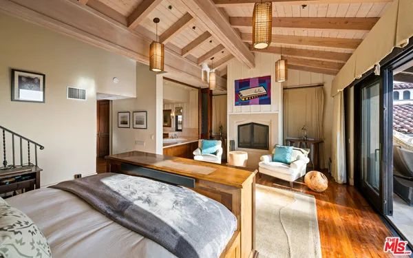 a large bathroom with a tub and shower