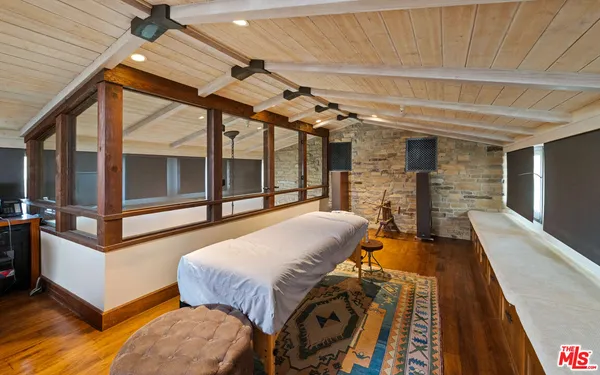 a large bathroom with a double vanity sink and a mirror