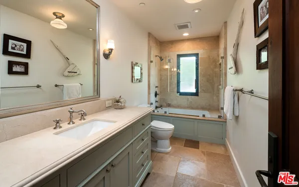 a room with a bed and a table