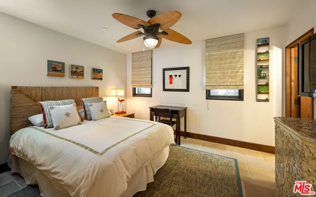 a patio with table and chairs