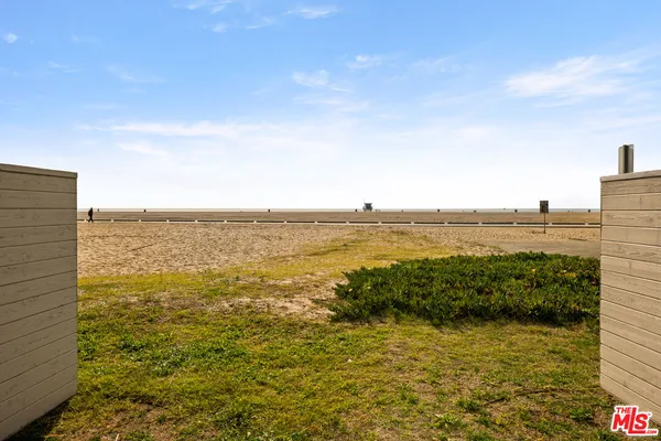 a view of a city with an ocean view