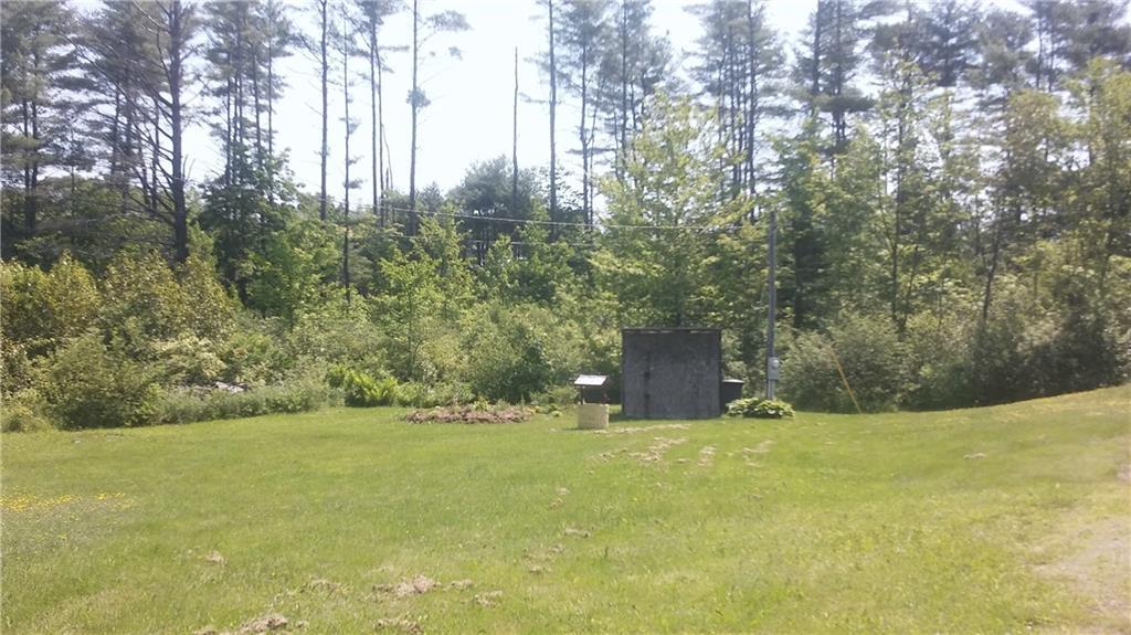 391 Canaan Road Clinton, ME 04927 - Photo 4 of 17 Side Yard with Small Shed