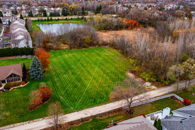 32-w396 Forest Drive Aurora, IL 60502 - Photo 1 of 1 an aerial view of a houses with a lake view