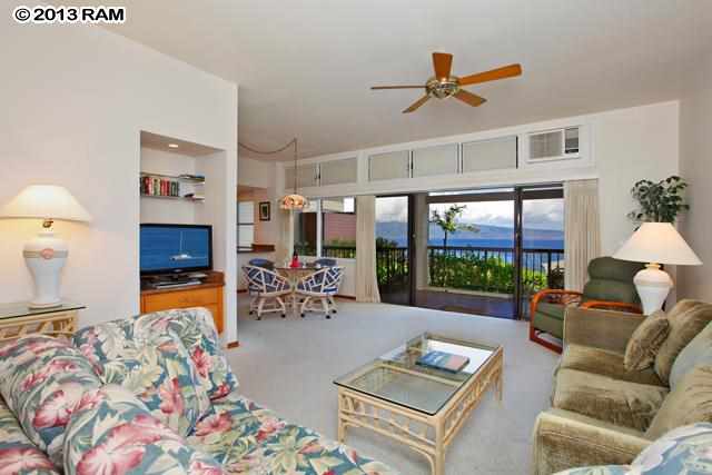 100 Ridge Road, Unit 2914 Lahaina, HI 96761 - Photo 9 of 24 a living room with furniture and a flat screen tv