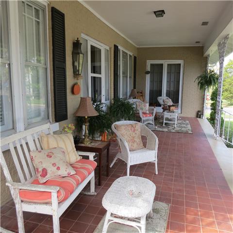 608 5th Avenue West Springfield, TN 37172 - Photo 3 of 19 Imagine Sitting on this Southern Style Front Porch