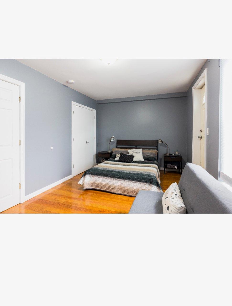 940 Bushwick Avenue Brooklyn, NY 11221 - Photo 5 of 7 Bedroom with hardwood / wood-style floors